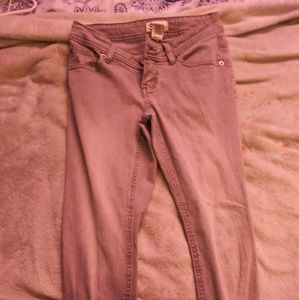 Grey jeans with distressed knees